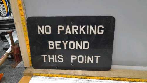 PAINTED EMBOSSED NO PARKING SIGN